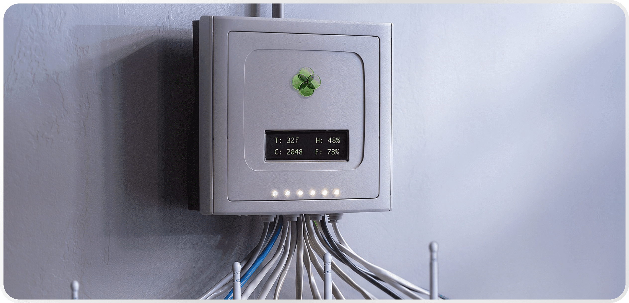 Agrigate IoT control unit displaying real-time poultry farm data
