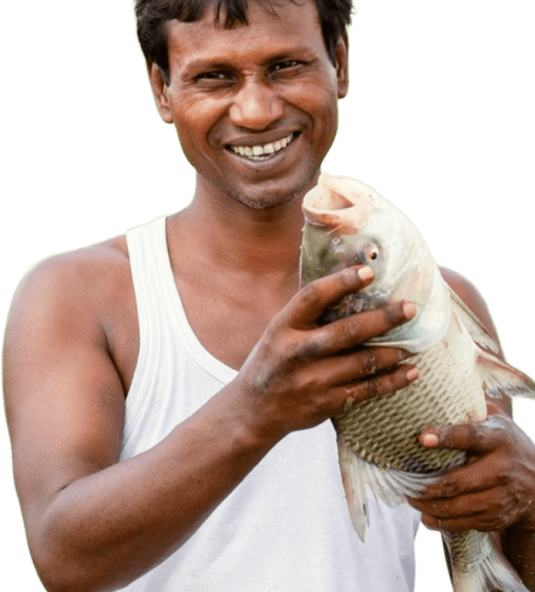 Farmer holding produce in the field